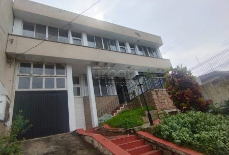 Casa com 380m², 4 quartos, 2 suítes, 4 vagas, no bairro Menino Deus em Porto Alegre