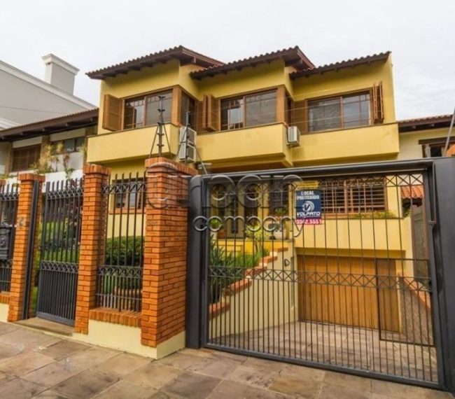 Casa com 600m², 4 quartos, 3 suítes, 3 vagas, no bairro Chácara das Pedras em Porto Alegre