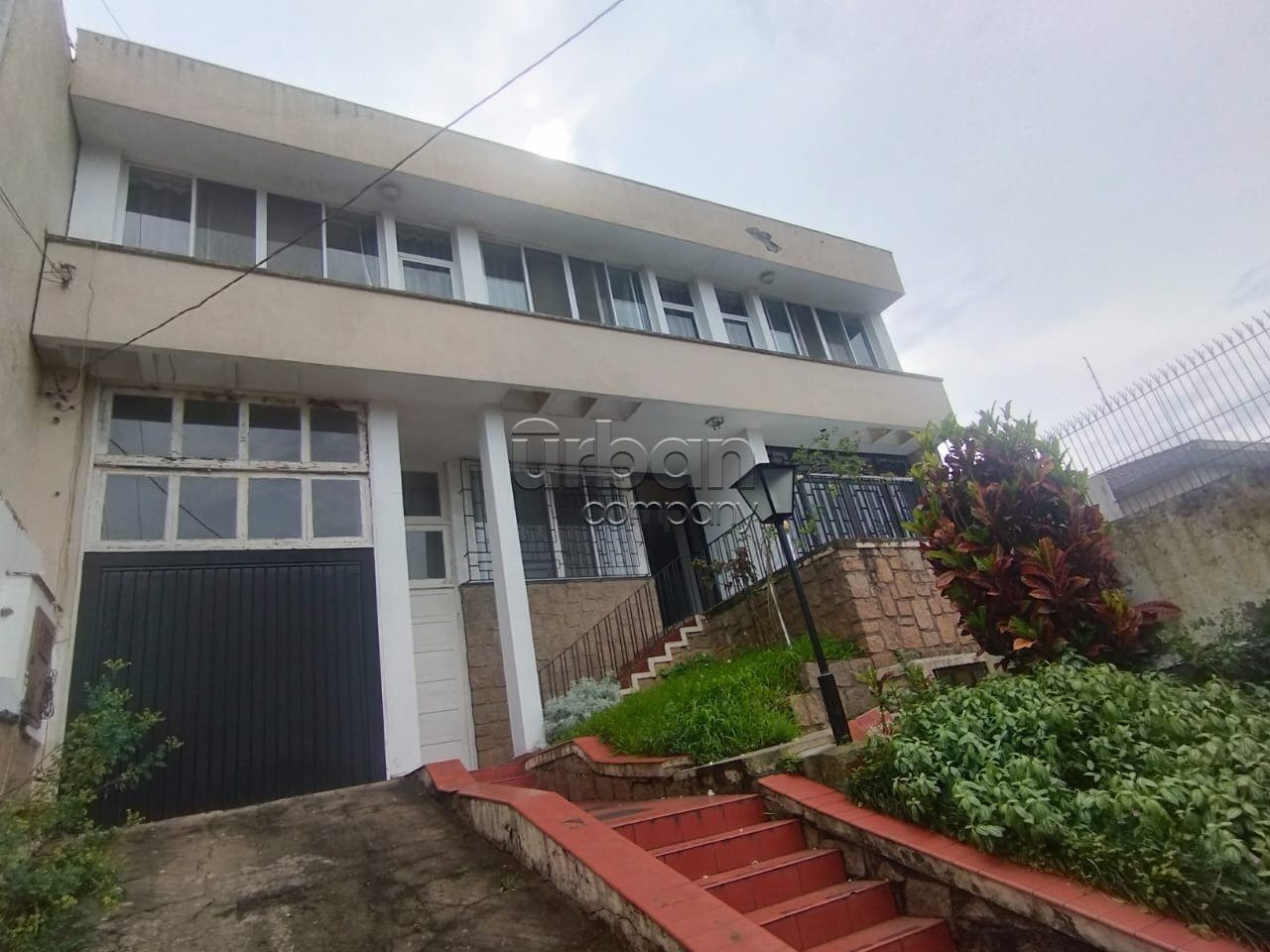 Casa com 380m², 4 quartos, 2 suítes, 4 vagas, no bairro Menino Deus em Porto Alegre